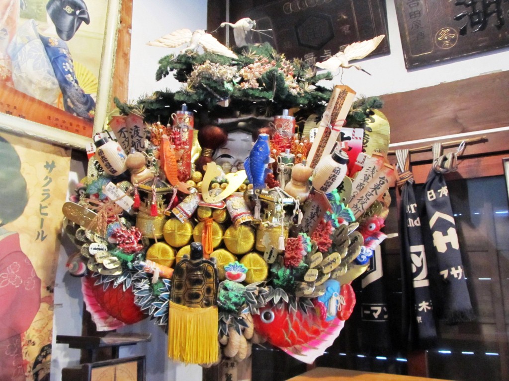 I will find what this exactly is, but my friend in Japan told me it was a display of Japnese Gods in the sake shop