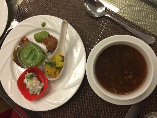 Sampling food at a five star dinning place